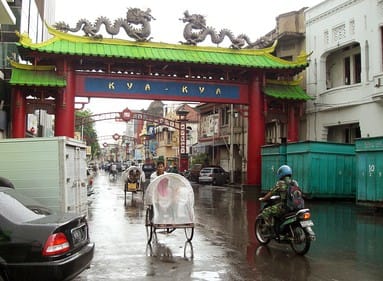 a busy street of chinatown in surabaya, indonesia